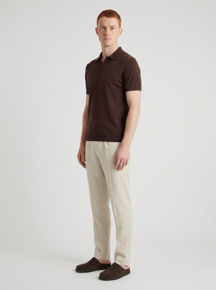 AI-generated model wearing a polo shirt against a studio backdrop