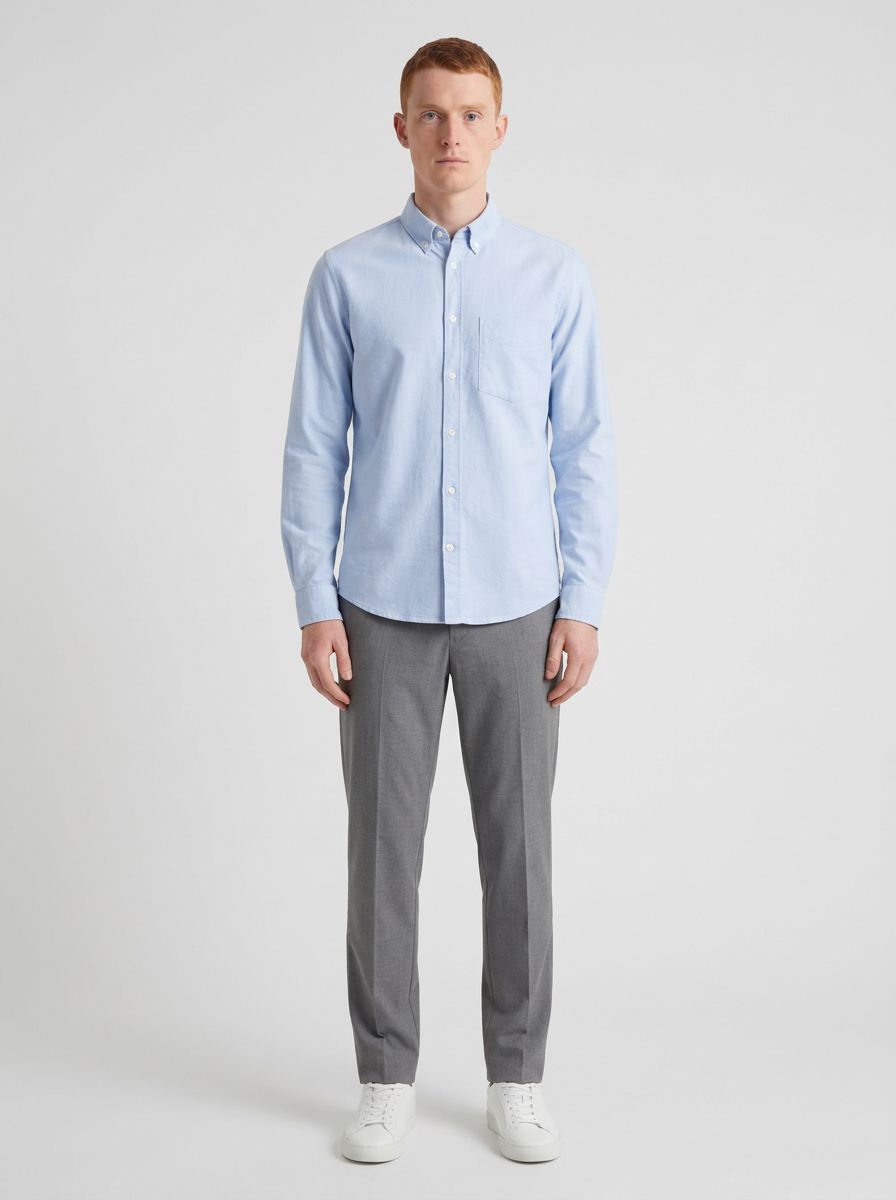 AI-generated model wearing a light blue shirt, front view