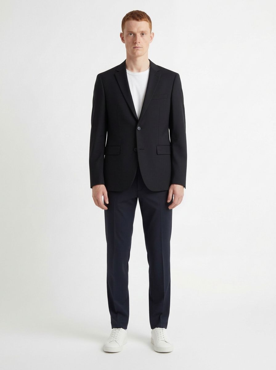 AI-generated model wearing a dark jacket and trousers, front view