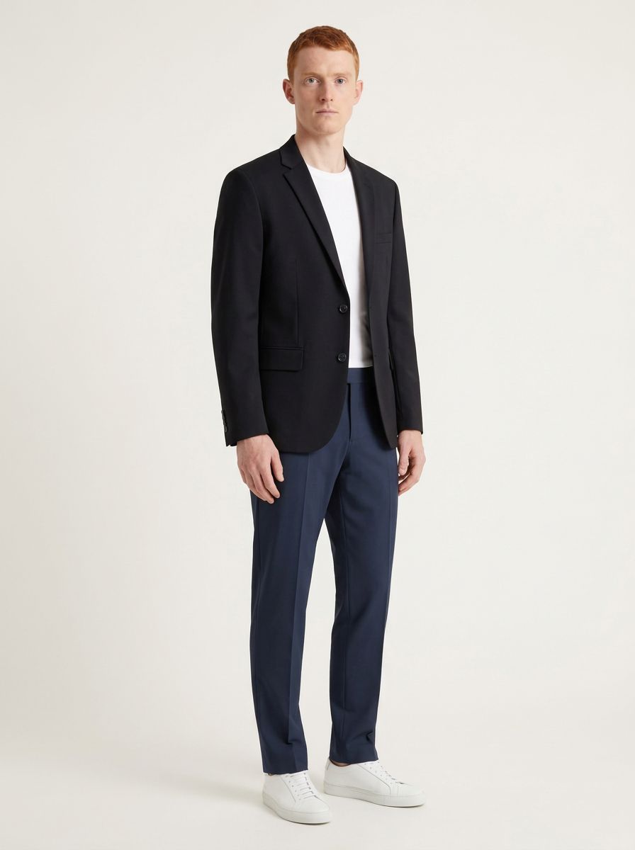 AI-generated model wearing a dark jacket and trousers, three-quarter view