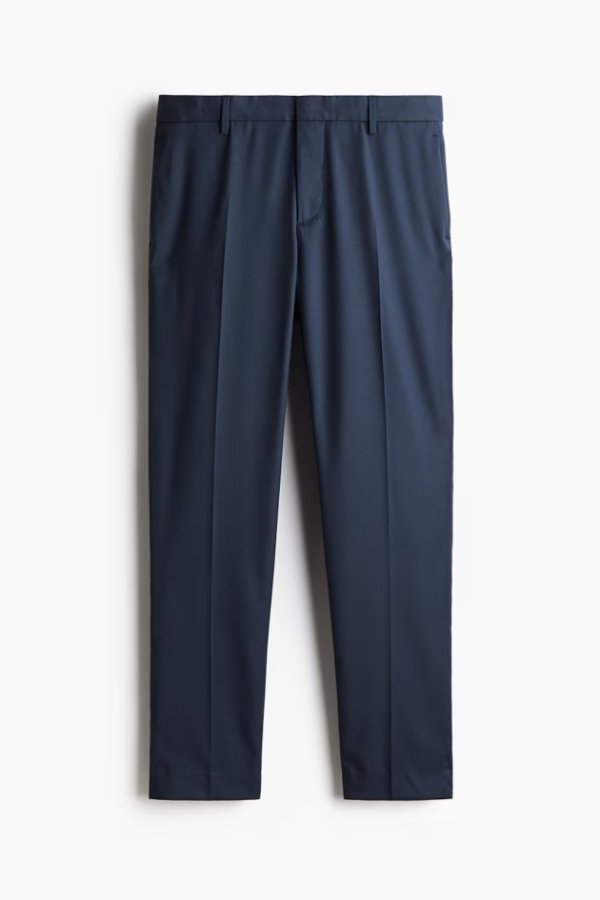 Original dark trousers product photo used as the second input